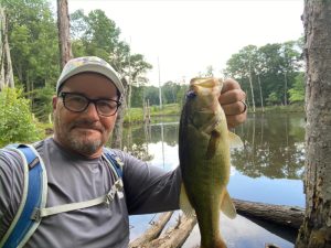 beginner angler catching first largemouth bass